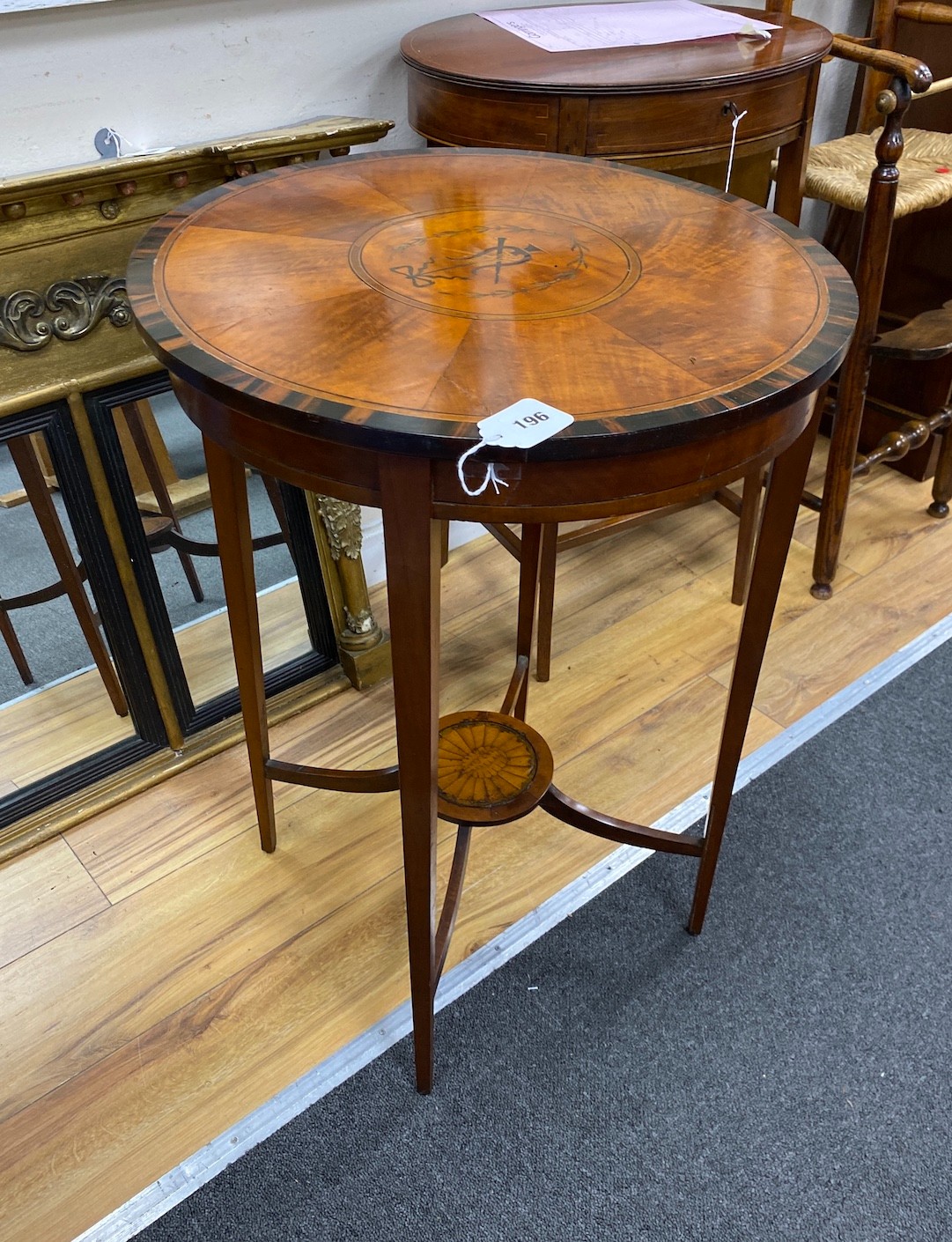 An Edwardian coromandel banded inlaid satinwood circular occasional table, diameter 51cm, height 72cm